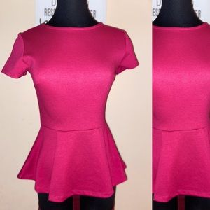 Magenta short sleeved peplum top